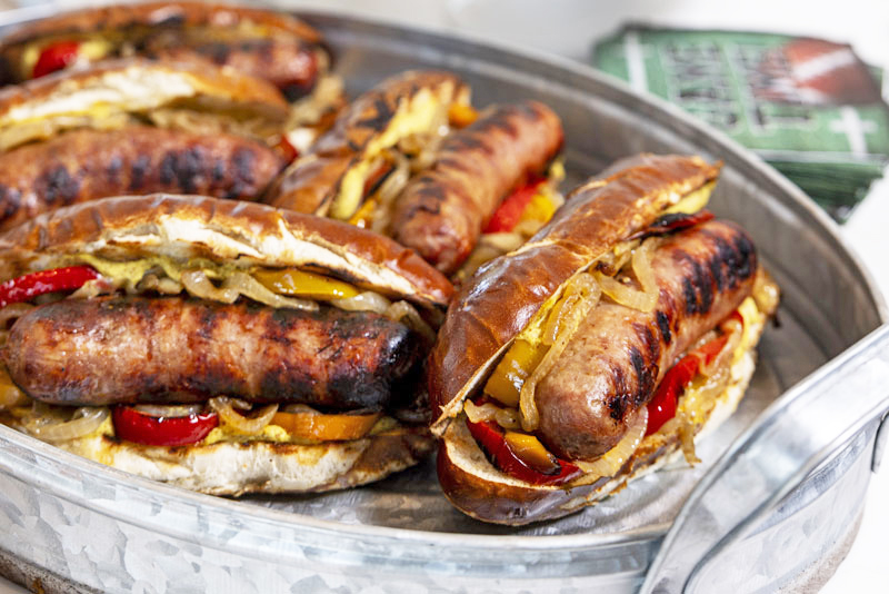 Grill Brats with Caramelized Bland Farms® Premium Sweet Onions
