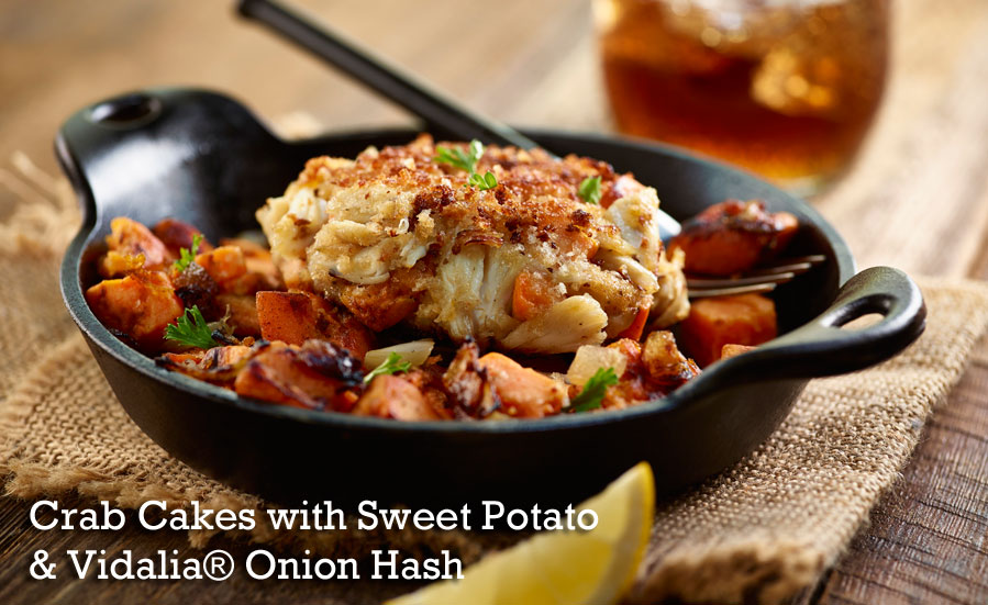 Crab cakes with sweet potato and vidalia onion hash